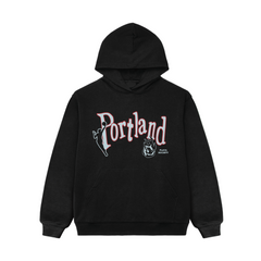 Black hoodie with 'Portland' text and burning rose graphics alonside the wnba logo